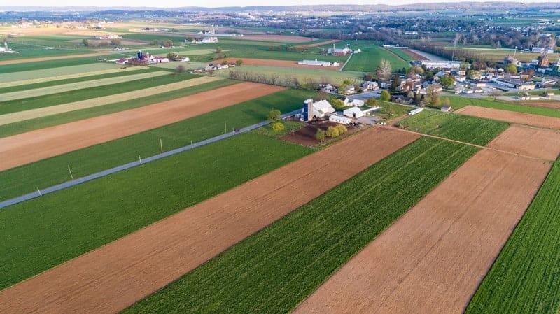 An aerial view of a farm and fields.