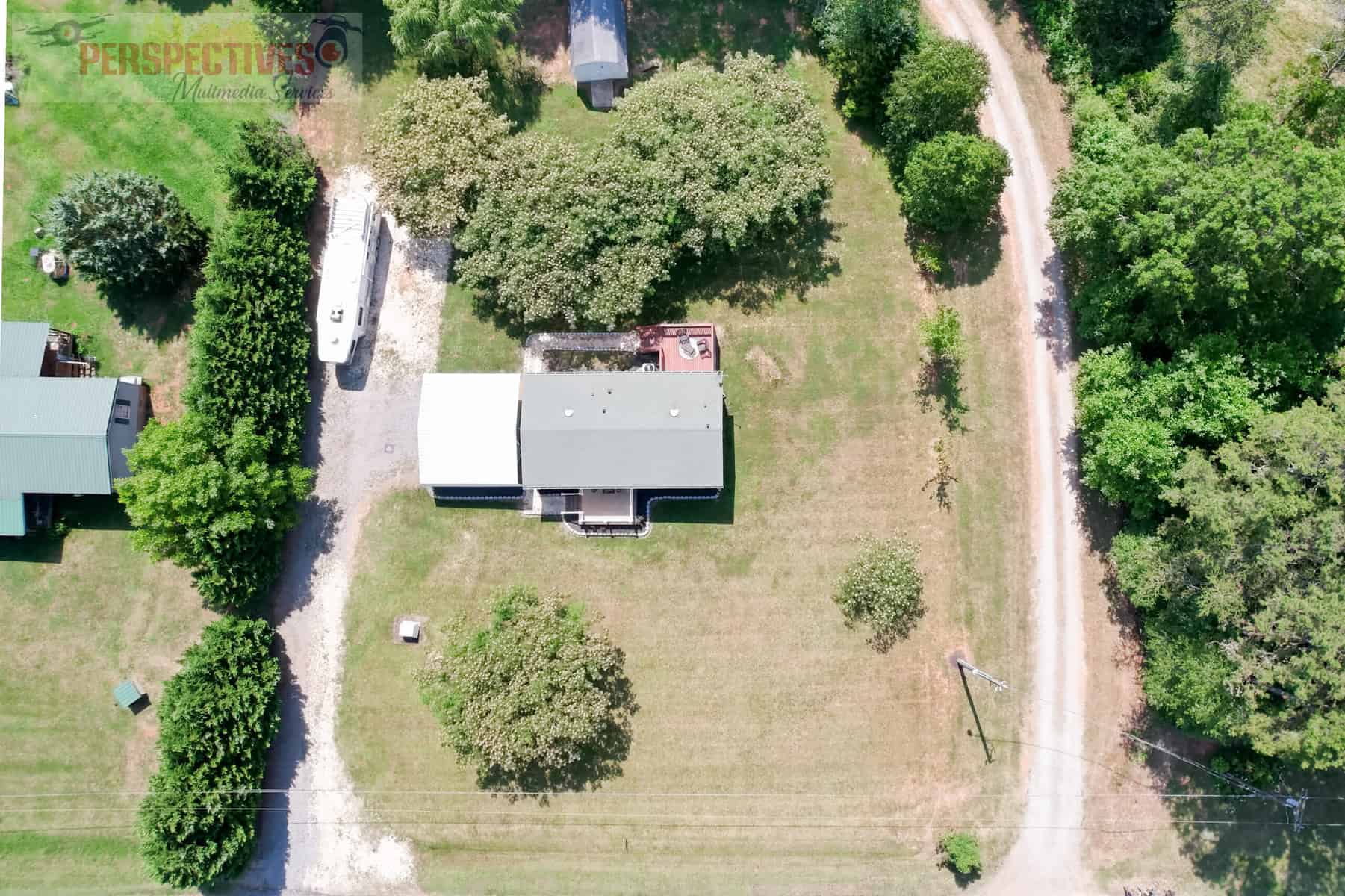 A house surrounded by trees.