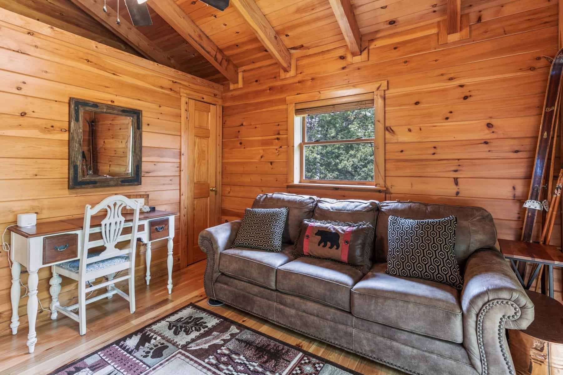 A living room in a log cabin.