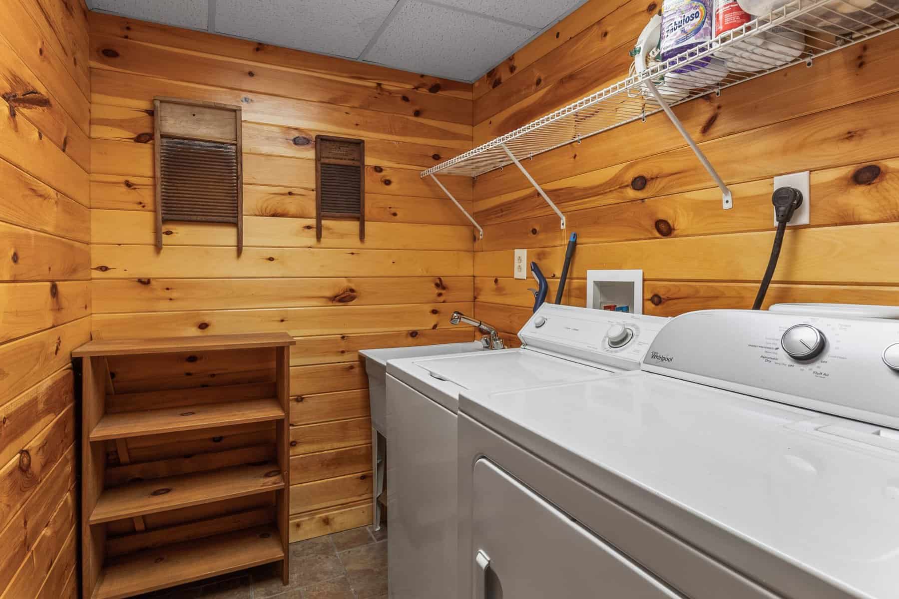 A laundry room with a washer and dryer.