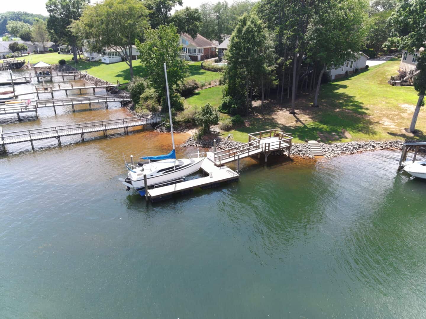 An aerial view of a dock with boats on it.